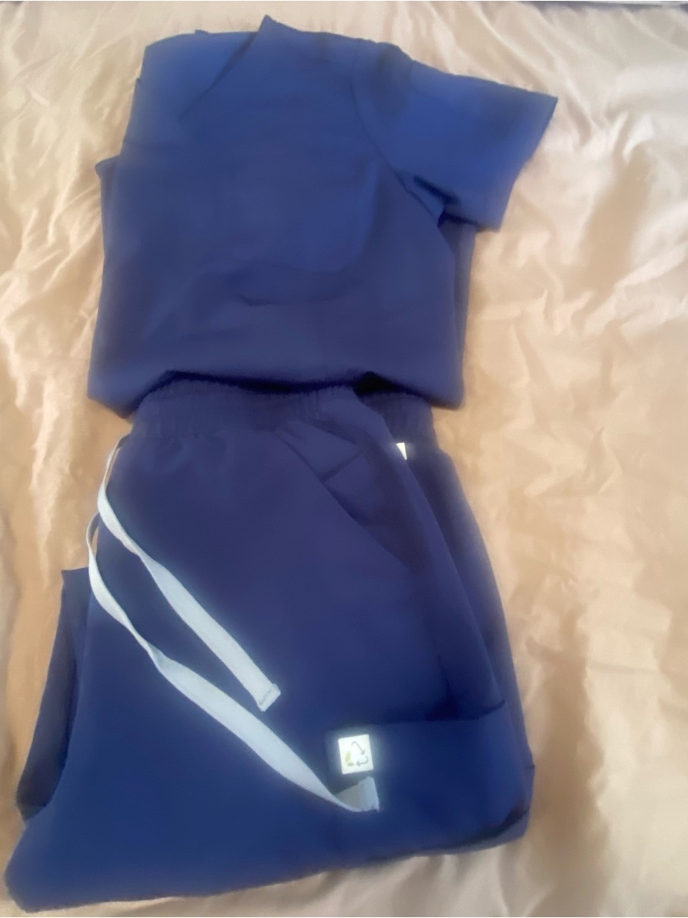 NWOT Resurge Navy Blue Two-Piece Scrub Set with Reflective Trim size S